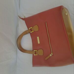 Red and tan JOY & IMAN purse